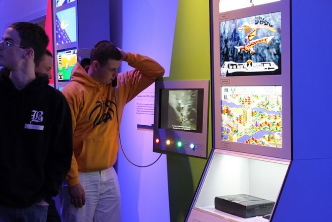 Twenty video game consoles from the past 40 years are on display in the exhibit. Each console features four games for that device that fans selected as being representatives for that stage in video game evolution.