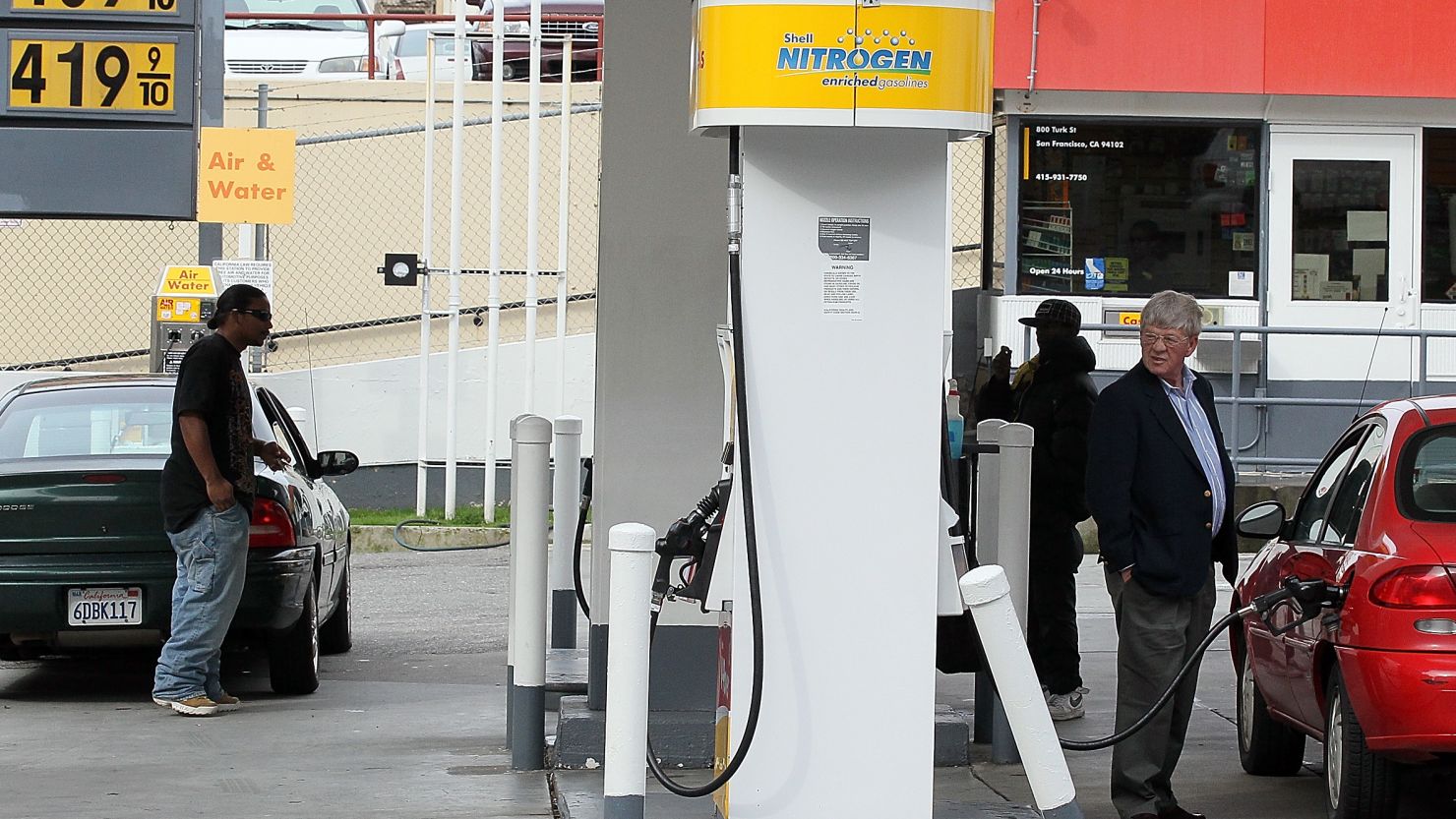 Customers pump gas last month at a Shell station in San Francisco, where prices exceeded $4 a gallon.