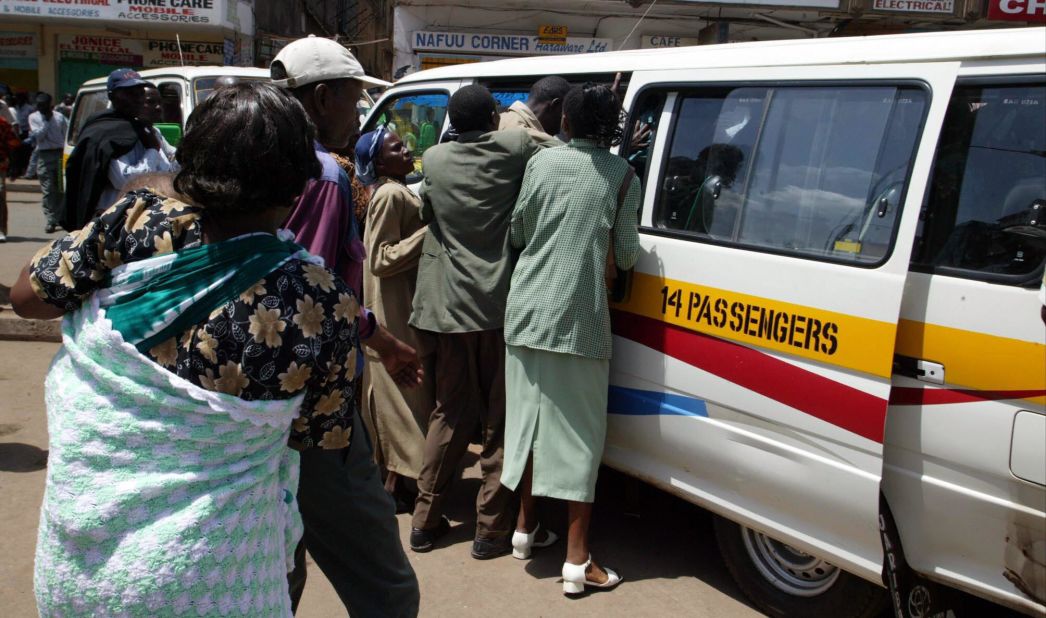 In Nairobi, many people have to ride to work in crowded, privately owned minibus taxis called "matatus."