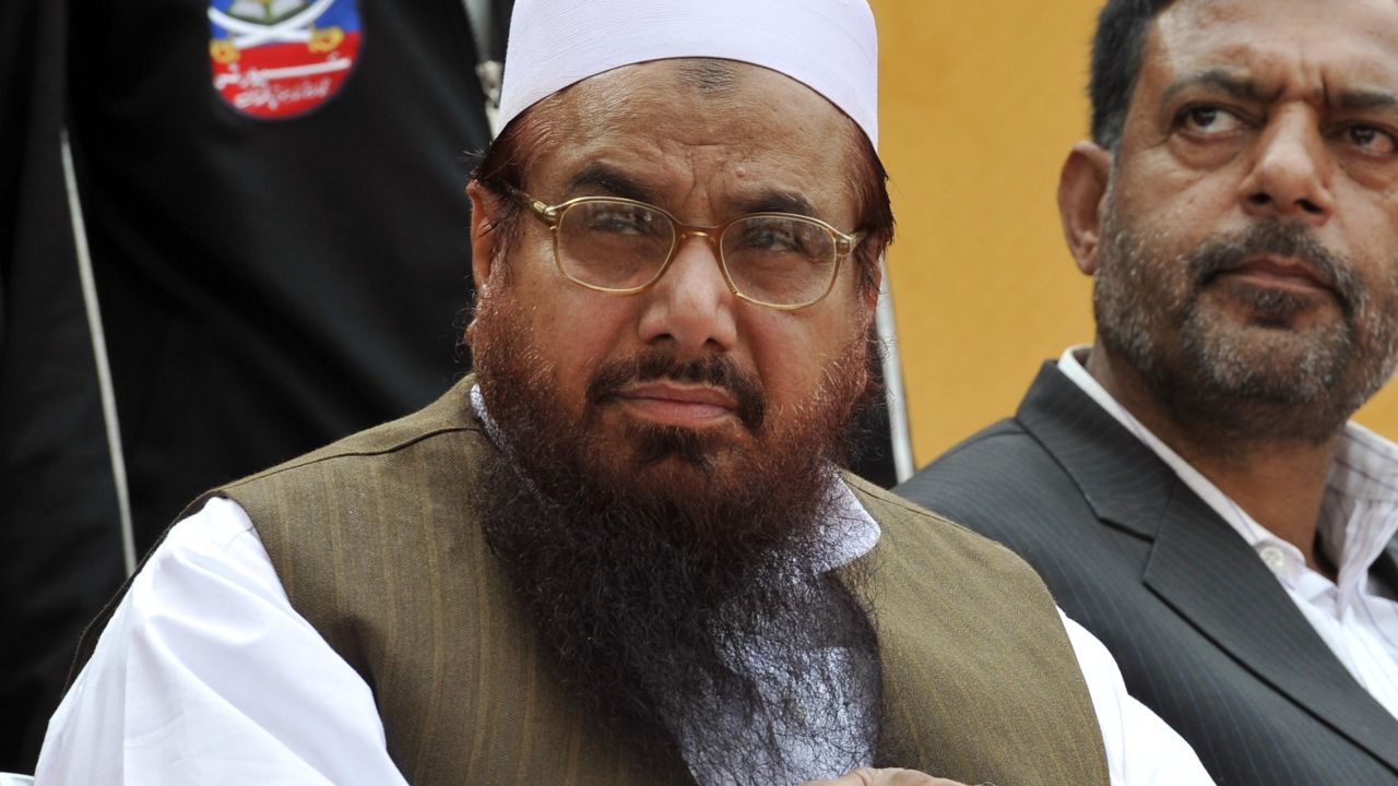 Hafiz Mohammad Saeed, left, seen in April 2011, is head of Pakistan's outlawed Islamic hard-line group Jamaat-ud-Dawa.