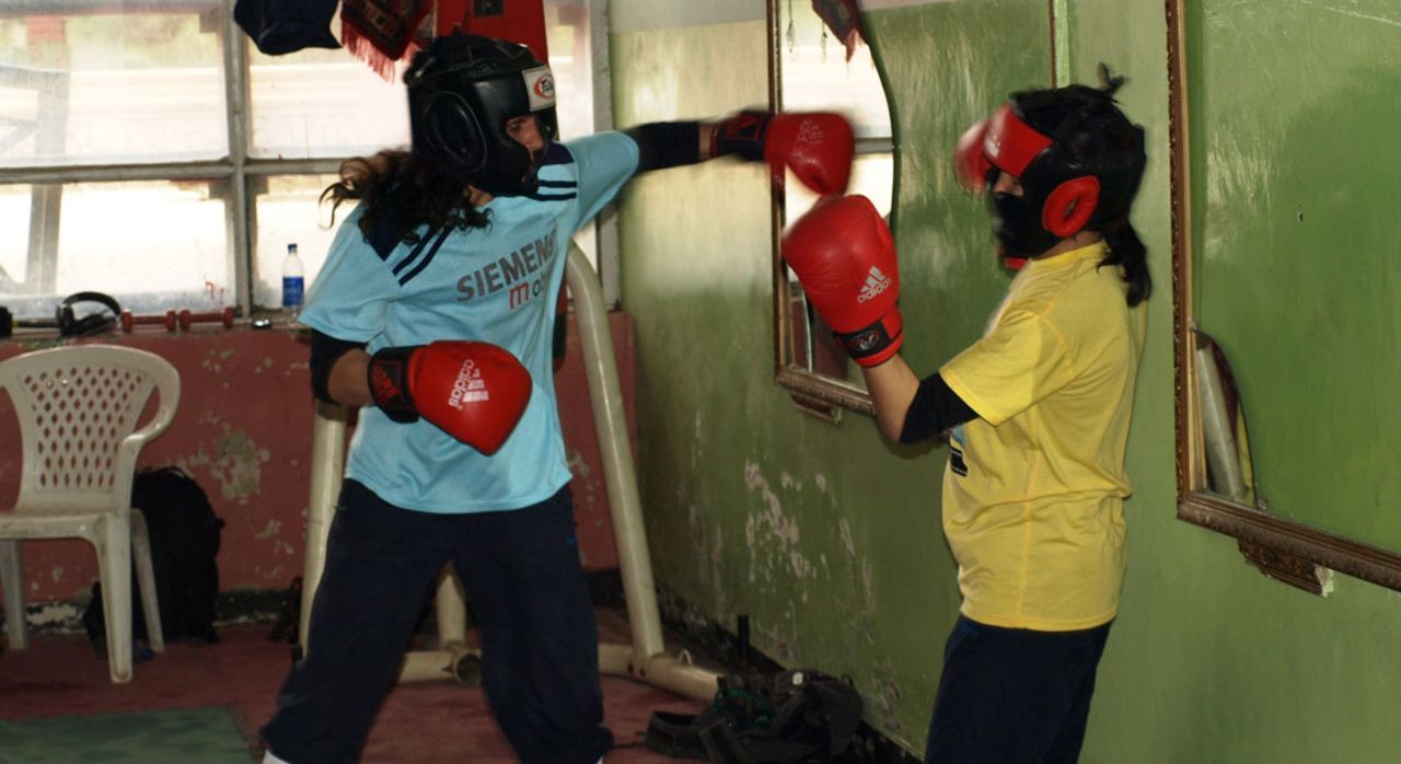 The boxing gym is a crumbling room inside Kabul's Ghazni stadium -- a venue for public executions under the Taliban.