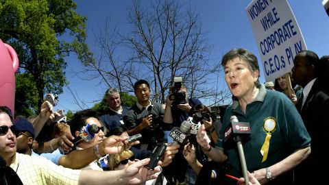 Martha Burk holds a news briefing during a protest outside Augusta National Golf Club during the Masters in 2003 in Georgia.  