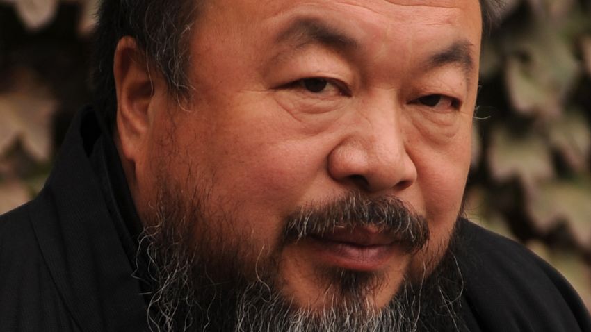 (FILES) This file picture taken on November 7, 2010 shows Chinese artist Ai Weiwei in the courtyard of his home in Beijing where he was under house arrest. Chinese artist and activist Ai Weiwei is reuniting with the Swiss architects with whom he created Beijing's spectacular Bird's Nest Stadium, to build a pavilion for this year's London Olympics. Ai, along with the Swiss firm Herzog and de Meuron, will join forces again to design a pavilion for the Serpentine Gallery in London's Kensington Gardens park, the gallery said on February 7, 2012. AFP PHOTO / FILES / Peter PARKS (Photo credit should read PETER PARKS/AFP/Getty Images)
