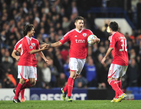 Javi Garcia's late goal gave Benfica hope at Stamford Bridge before Raul Meireles scored Chelsea's second.
