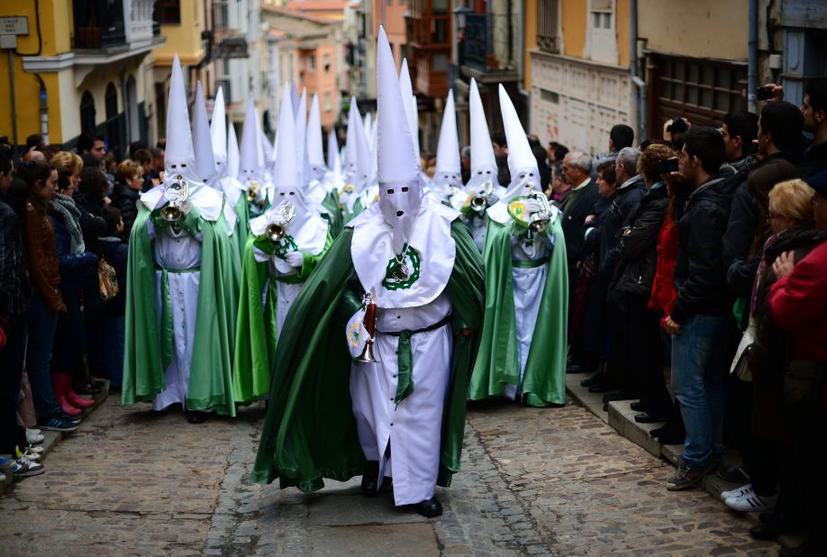 Penitents walk up Calle Balborraz during the Holy Week procession of the Cofradia de la Virgen de la Esperanza (Brotherhood of Our Lady of Hope) in Zamora, Spain.