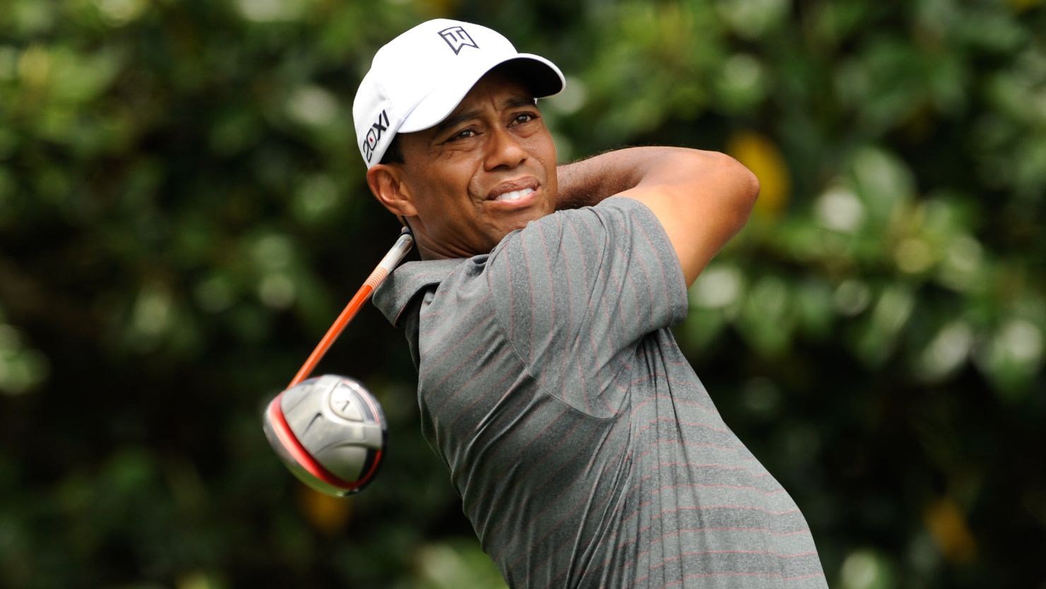 Tiger Woods tees off on the ninth hole at Augusta National during his opening round at the U.S. Masters. 