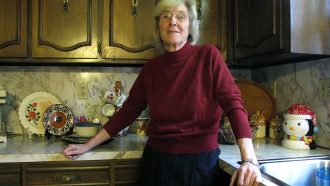 Anneliese MacPhail stands in the kitchen in her home in Columbus, Georgia, where her son Mark always stood.
