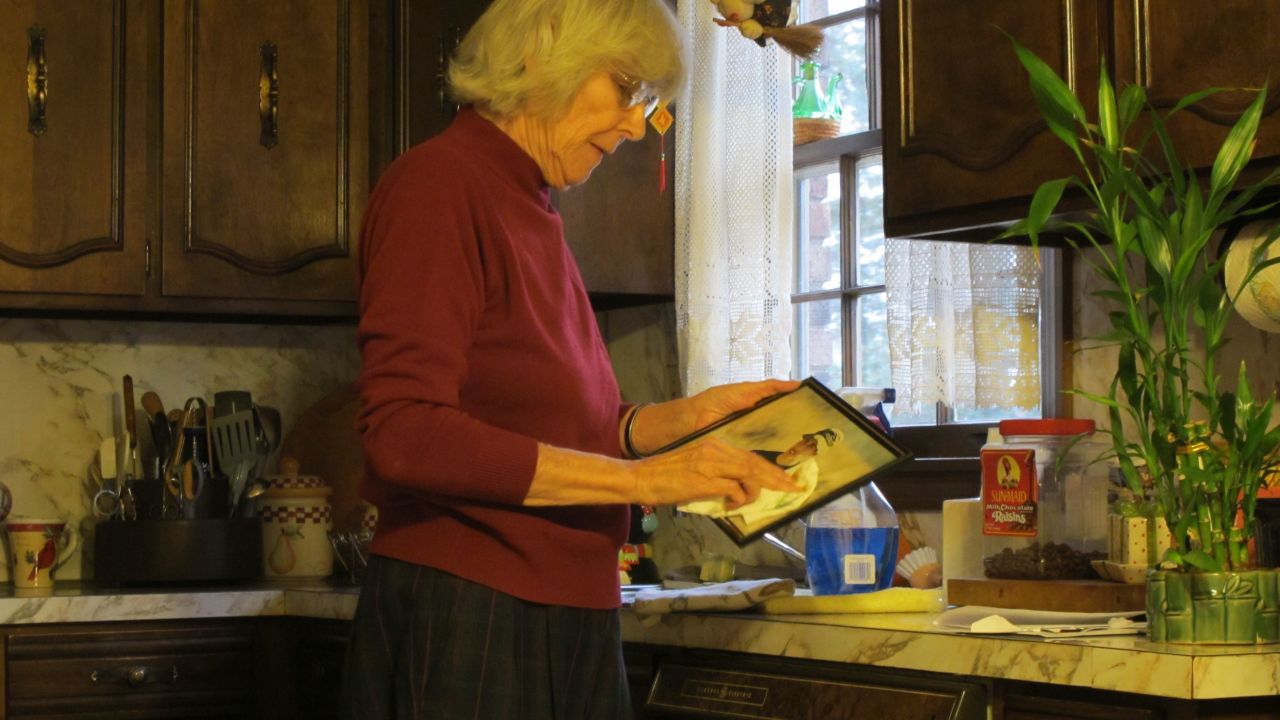 Anneliese MacPhail dusts off a photograph of her son, Mark.