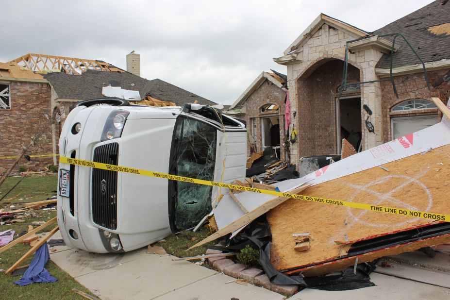 Between six and 13 tornadoes might have touched down in north Texas on Tuesday, the National Weather Service in Dallas-Fort Worth said. The number is an estimate pending a survey and damage assessment.