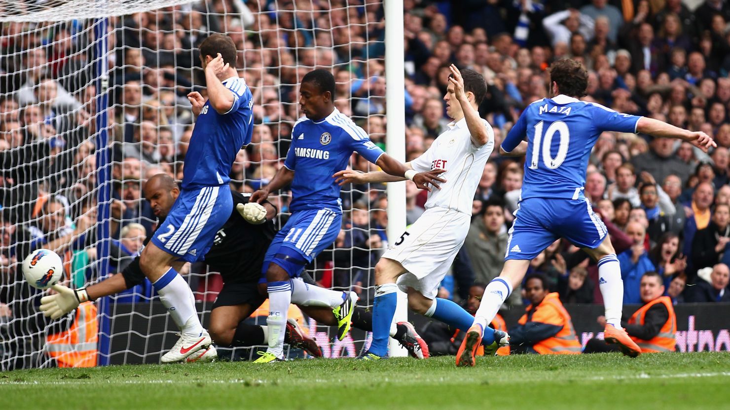 Juan Mata (No.10) scores Chelsea's winning goal against Wigan at Stamford Bridge on Saturday