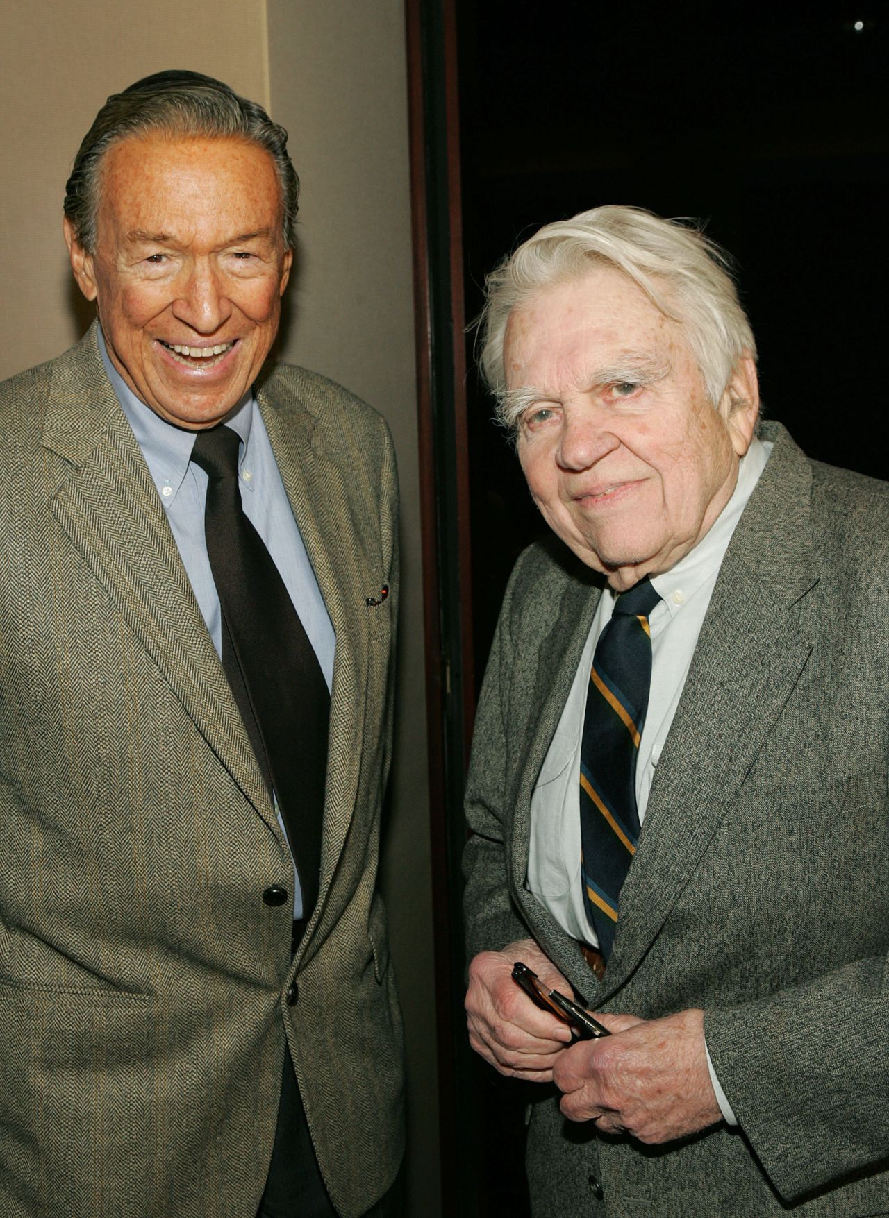 Wallace and and fellow "60 Minutes" correspondent Andy Rooney attend a 2005 screening of "Enron: The Smartest Guys in the Room" in New York. 