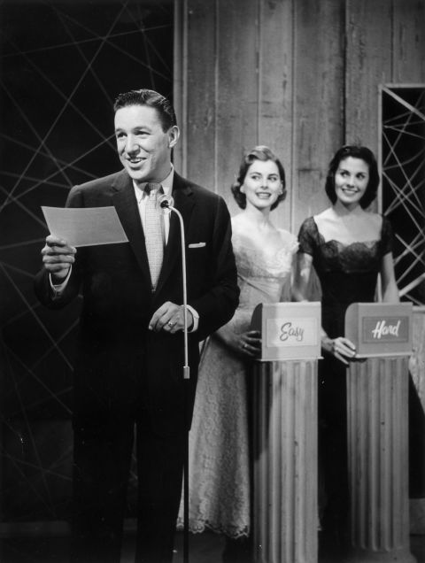 Wallace, as host, reads a question in this production still from the 1956 quiz show, "Big Surprise."