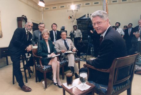 "60 Minutes" reporters  Ed Bradley, back row from left,  Morley Safer, Steve Kroft, Lesley Stahl and Mike Wallace pose for a photo with President Bill Clinton at the White House in 1995. Wallace was with "60 Minutes" when it debuted in 1968. In 2006, he became a correspondent emeritus and stopped appearing regularly.