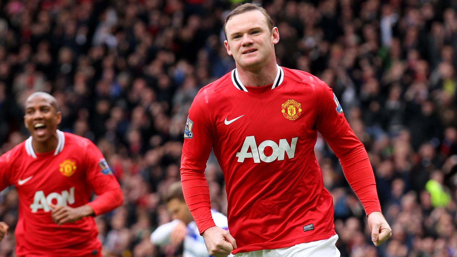 Wayne Rooney celebrates scoring in Manchester United's 2-0 win over QPR at Old Trafford.