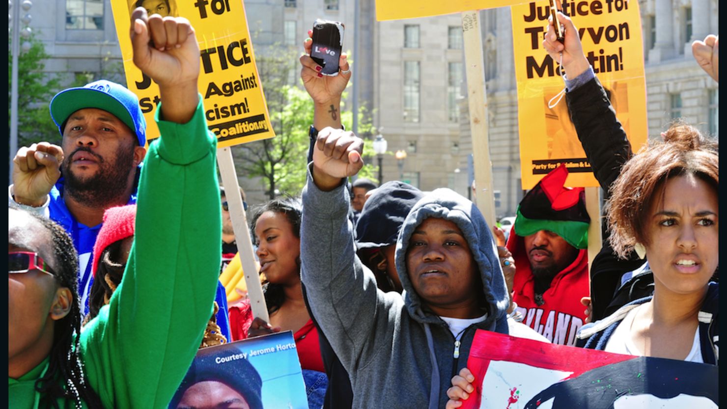Activists march last week in Washington demanding justice in the death of Trayvon Martin.