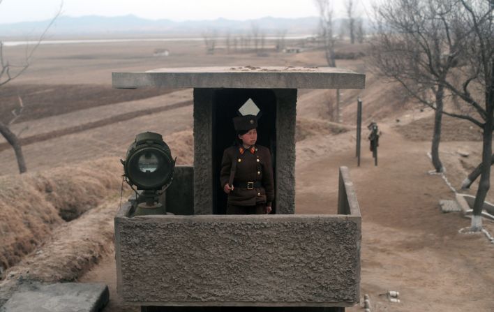 The usually secretive North Korea organised an unprecedented visit for foreign reporters to Tongchang-ri space centre on April 8. During the train journey from Pyongyang to the North Pyongan Province, a journalist took this picture of a North Korean soldier standing at an observation post.