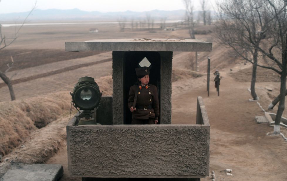 The usually secretive North Korea organised an unprecedented visit for foreign reporters to Tongchang-ri space centre on April 8. During the train journey from Pyongyang to the North Pyongan Province, a journalist took this picture of a North Korean soldier standing at an observation post.