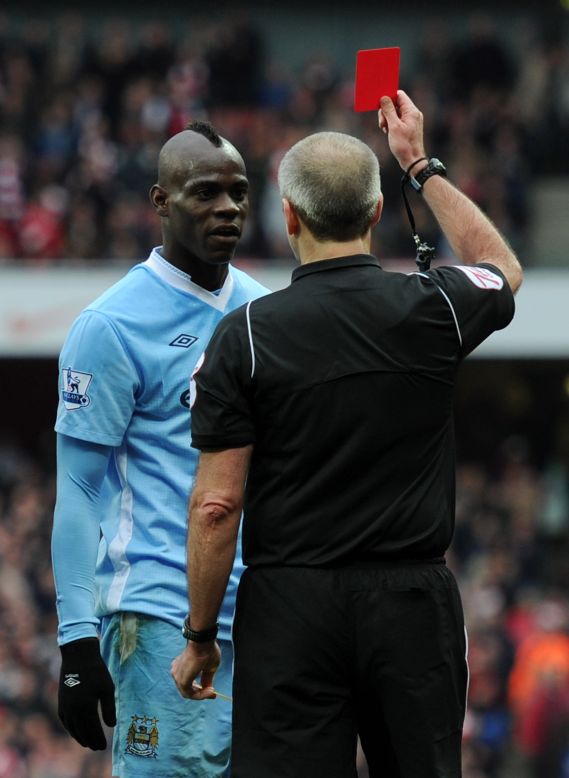 Balotelli is red-carded after a foul on Arsenal's Barcary Sagna on Sunday. Man City lost the match 1-0, with manager Robert Mancini later saying: "It's clear he's created big problems, but he's scored important goals."