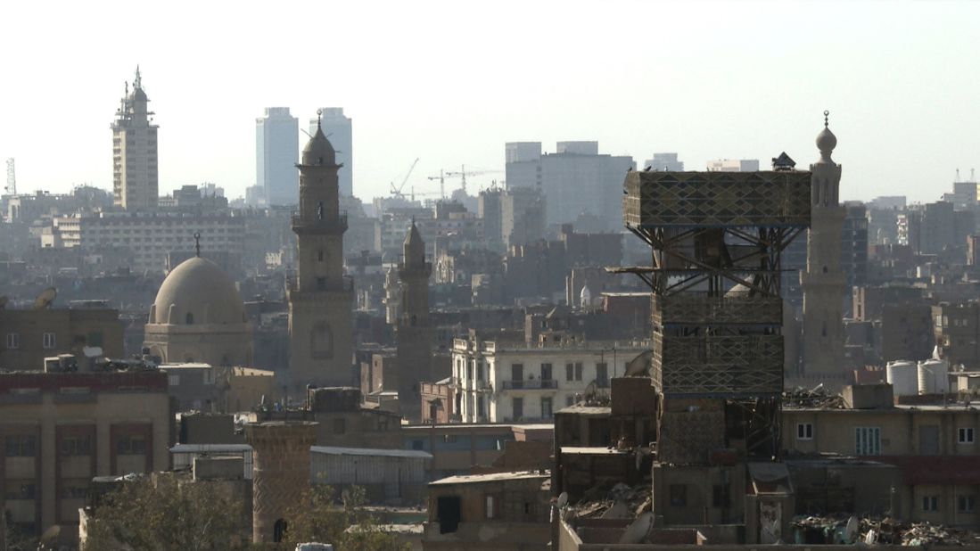 A pigeon loft (towards to right of the picture) rising several floors above most other buildings on the Cairo skyline.