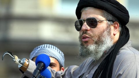 Radical muslim clerk Sheikh Abu Hamza gestures at the 'Rally for Islam' in central London in August 2002.