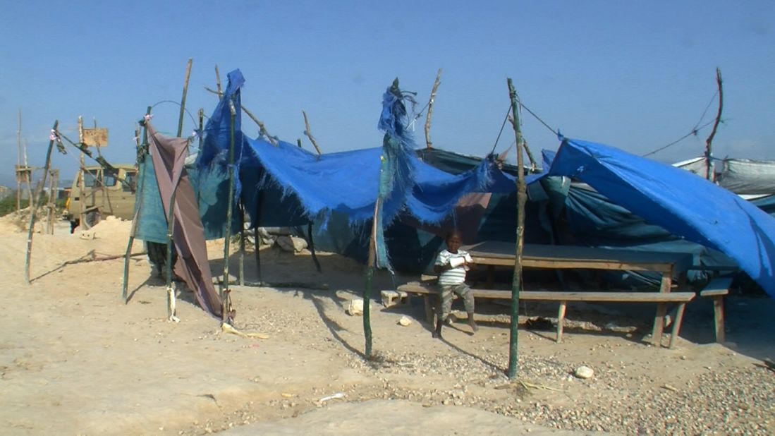 This Haitian orphanage within of one of Port-au-Prince's largest tent cities is home to almost 30 children. Pieces of tarp and tents provide the only shelter for the children who live there.