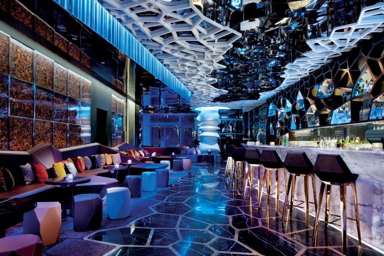 The glitzy bar at the Ritz-Carlton, Hong Kong, is a world away from the simple motels of the 1950s. Marriott's first foray into in Asia was with the JW Marriott Hotel Hong Kong, opened in 1989. "I had a feeling we had to be in Asia, we had to be over there," said Marriott. "There was growth coming."