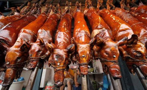 Lechon (roasted suckling pig), a holdover from Spanish colonial times, is an iconic national dish enjoyed during festivities, including weddings and Christmas celebrations.