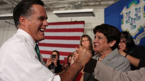 Mitt Romney greets supporters Wednesday at Alpha Graphics in Hartford, Connecticut.