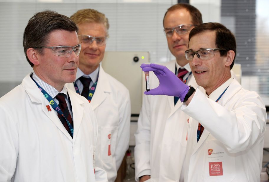 Professor David Cowan (right), head of the London 2012 lab, shows UK Olympics minister Hugh Robertson around the drug-testing facility in east London.