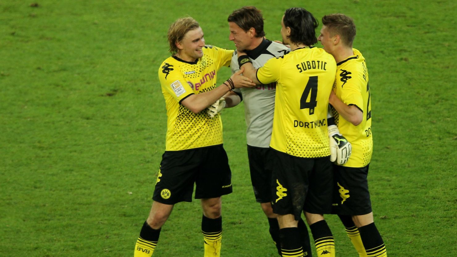Borussia Dortmund's players celebrate after their vital 1-0 home win over Bayern Munich.