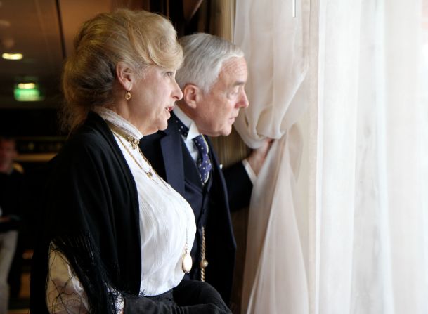 Byron and Judy Matson of Missouri peer out a window aboard the ship.