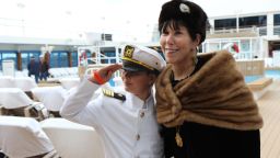 Patrick Druckenmiller, 9, received the trip aboard the Titanic anniversary cruise as a gift from his grandmother, Stephanie Hayes, right. Patrick is dressed as Titanic Capt. Edward John Smith. The cruise aboard the Azamara Journey departed from New York on Tuesday.