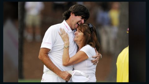 Bubba Watson hugs his mother, Mollie, after winning the 2012 Masters golf tournament.