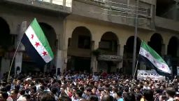 An image grab taken from a video uploaded on YouTube shows Syrians demonstrating in the Damascus suburb of Duma on April 13, 2012. 