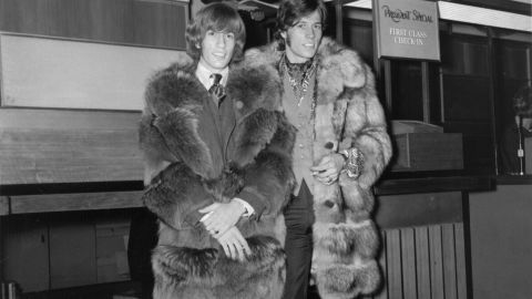 Robin Gibb, left, and brother Barry at London's Heathrow Airport in 1967.