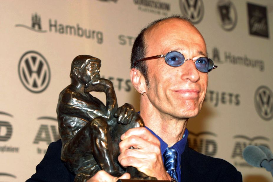 Robin Gibb displays his World Artist Award for Lifetime Achievement during the 2003 World Awards in Hamburg, Germany. Gibb accepted the award on behalf of the Bee Gees.