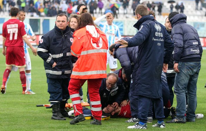 Medics treat Morosini on the pitch in Pescara after he suffered a heart-attack during the Serie B match. 