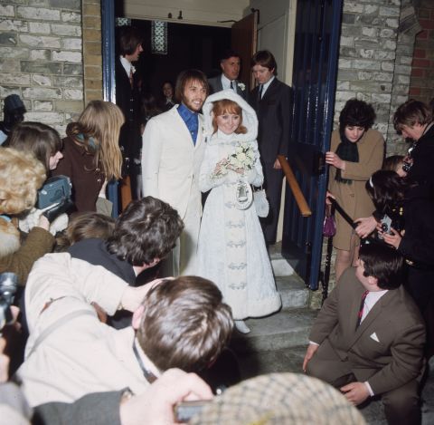 Maurice Gibb and his new bride, Scottish pop singer Lulu, exit Gerrards Cross Church in  Buckinghamshire, England, on February 18, 1969.