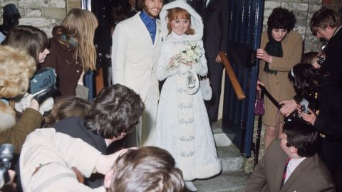Maurice Gibb and his new bride, Scottish pop singer Lulu, exit Gerrards Cross Church in Buckinghamshire, England, on February 18, 1969.