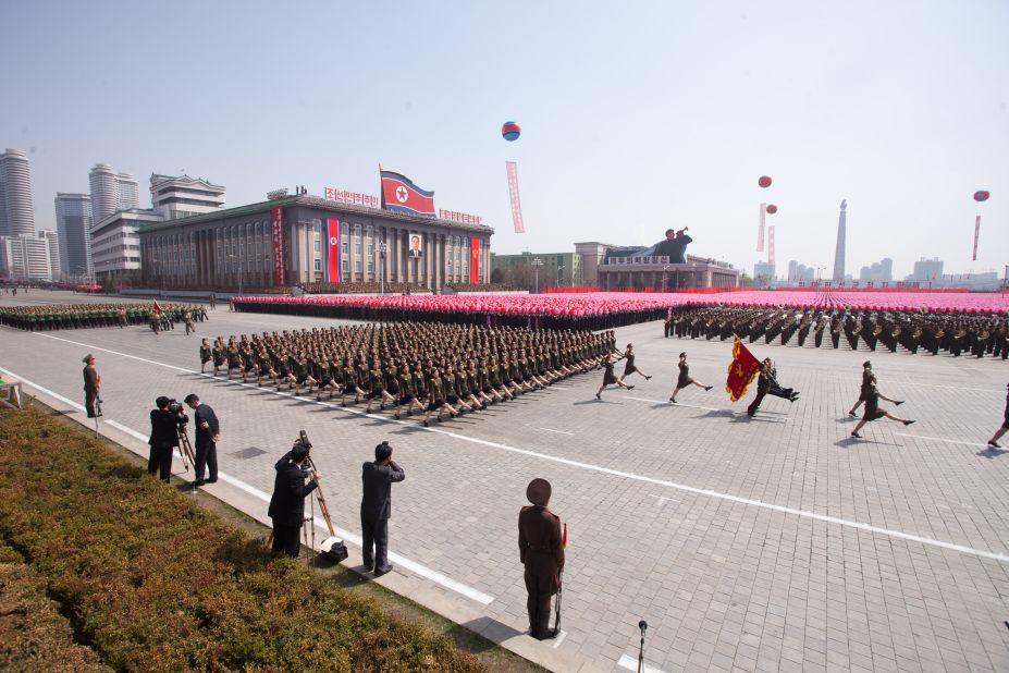North Korean soldiers march past the podium during the parade in Pyongyang on Sunday.  Elaborate and extensive 100th anniversary celebrations of Kim Il Sung's birth have been in the works for years. Grandson Kim Jong Un is now North Korea's "supreme commander" -- a title he has recently assumed, following the death of his father, Kim Jong Il.