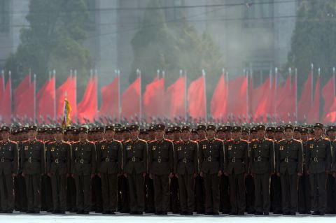 North Korean soldiers stand in formation during the parade on Sunday.