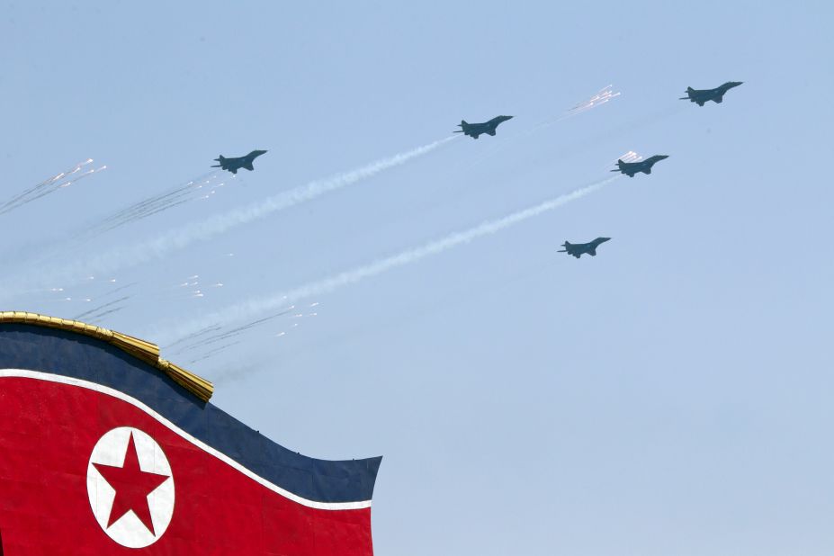 North Korean jet aircraft perform a fly-over during the  parade on Sunday. 