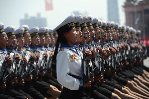 Female members of North Korea's military march during  at the parade.