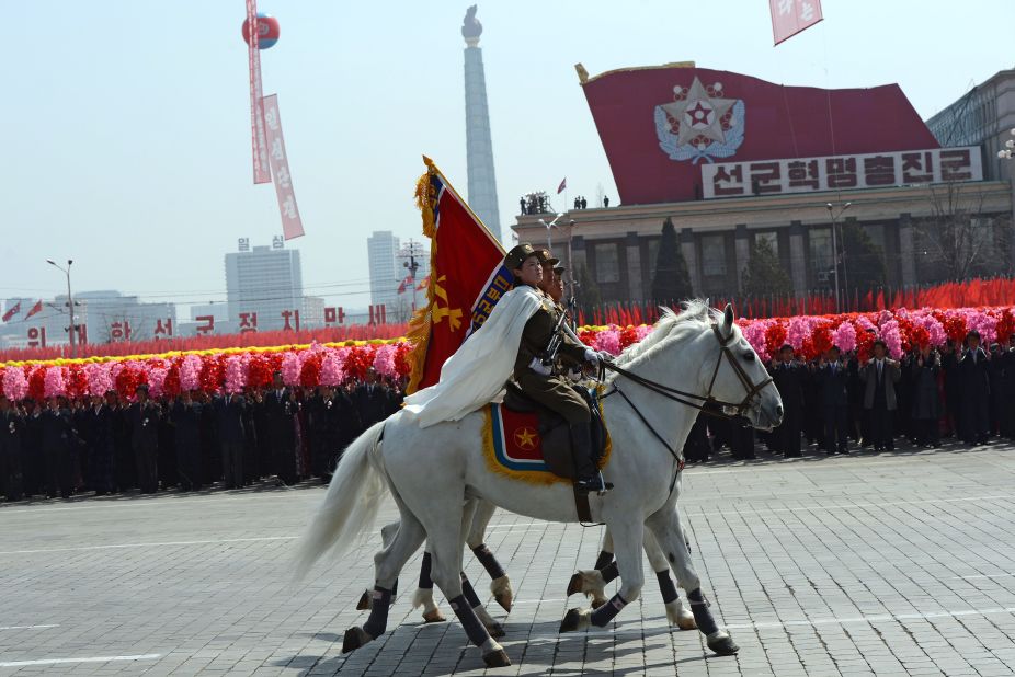 Mounted North Korean military personel take part in the  parade.