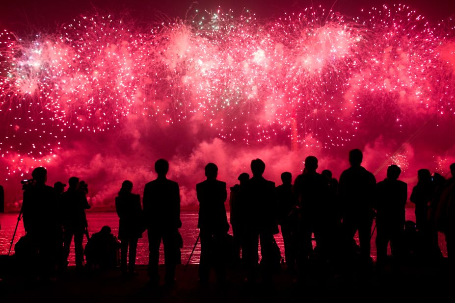 Spectators  watch a fireworks display to mark 100 years since the birth of North Korea's founder Kim Il Sung in Pyongyang on Sunday.