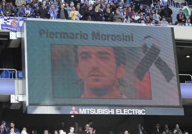 Piermario Morosini's face is projected on the big screen before Sunday's La Liga game between Espanyol and Valencia. The Spanish teams observed a minute's silence in memory of the Italian midfielder, who died after a suspected heart attack on Saturday April 14.