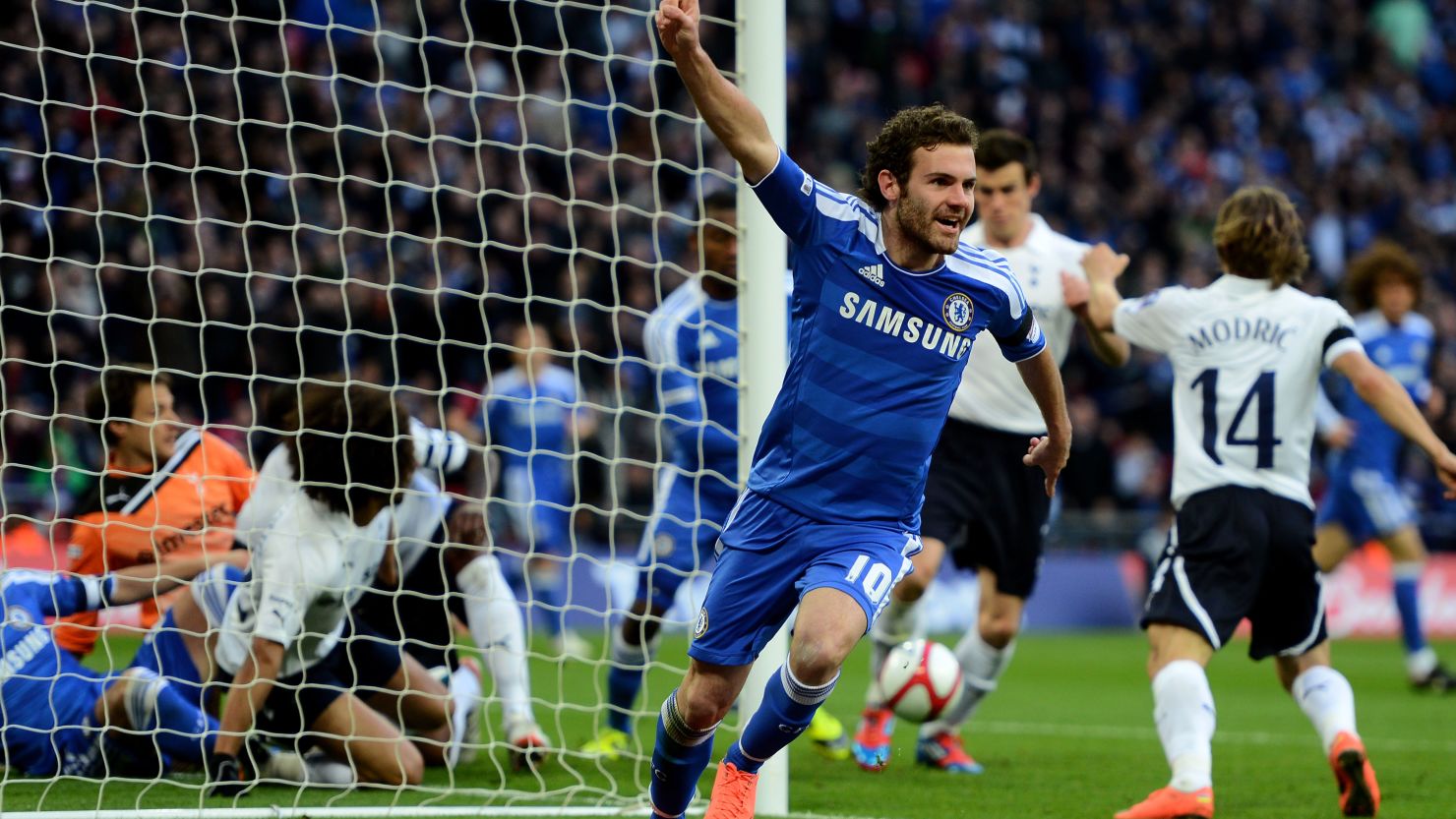 Juan Mata celebrates his controversial goal at Wembley against Tottenham Hotspur.