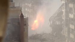 Still taken from YouTube video purports to show fresh shelling in Homs during U.N. cease-fire. 