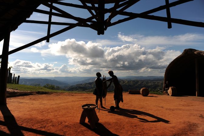 Members of South Africa's Zulu tribe dance on top of the famous Valley of a Thousand Hills on the outskirts of Durban. The area is named after the hills that tumble down to the Umgeni River.
