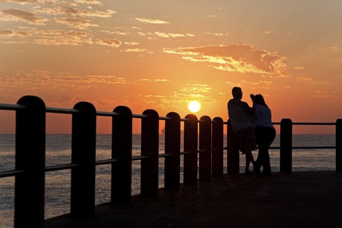 The sun sets over the Durban Pier. The cosmopolitan city of 3.5 million residents has undergone dramatic modernization over the last half century, but with a number of exquisite blue-flag beaches, the region still retains some of its natural charm.